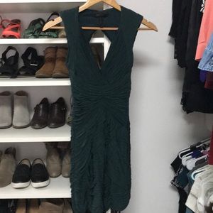 Dark green BCBG cocktail dress, with low back.